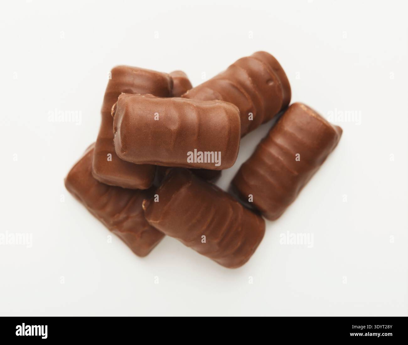 Small chocolate candies isolated on white Stock Photo