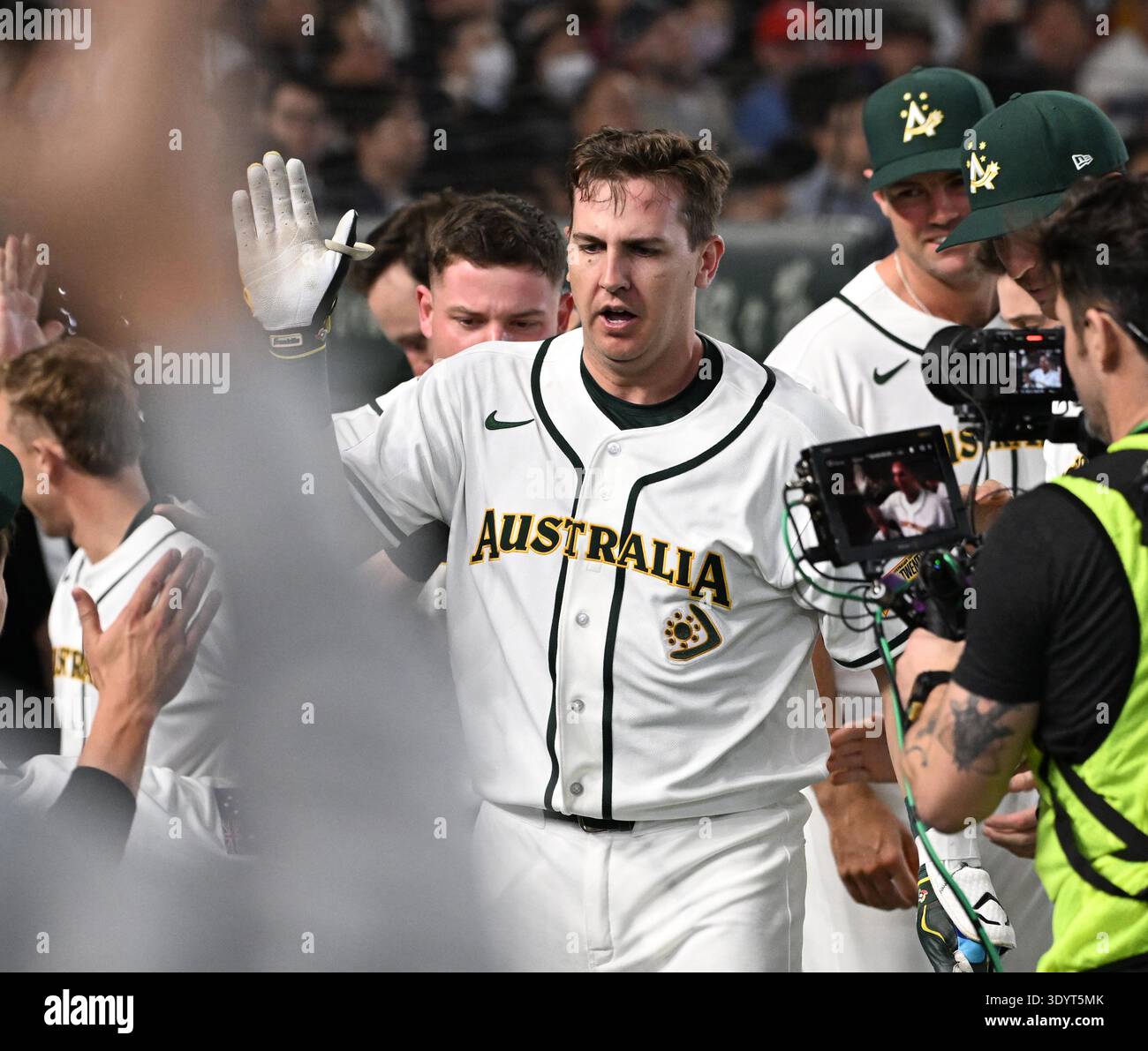 Robbie Glendinning of Australia hits home run in the 5th inning of the ...