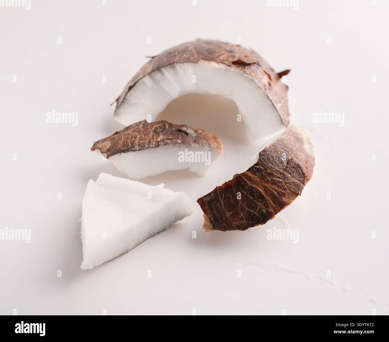 Coconut pieces isolated on a white background Stock Photo