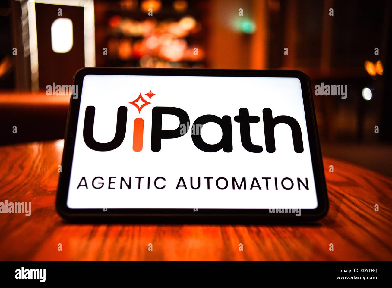 In this photo illustration, the logo of UiPath is displayed on the ...