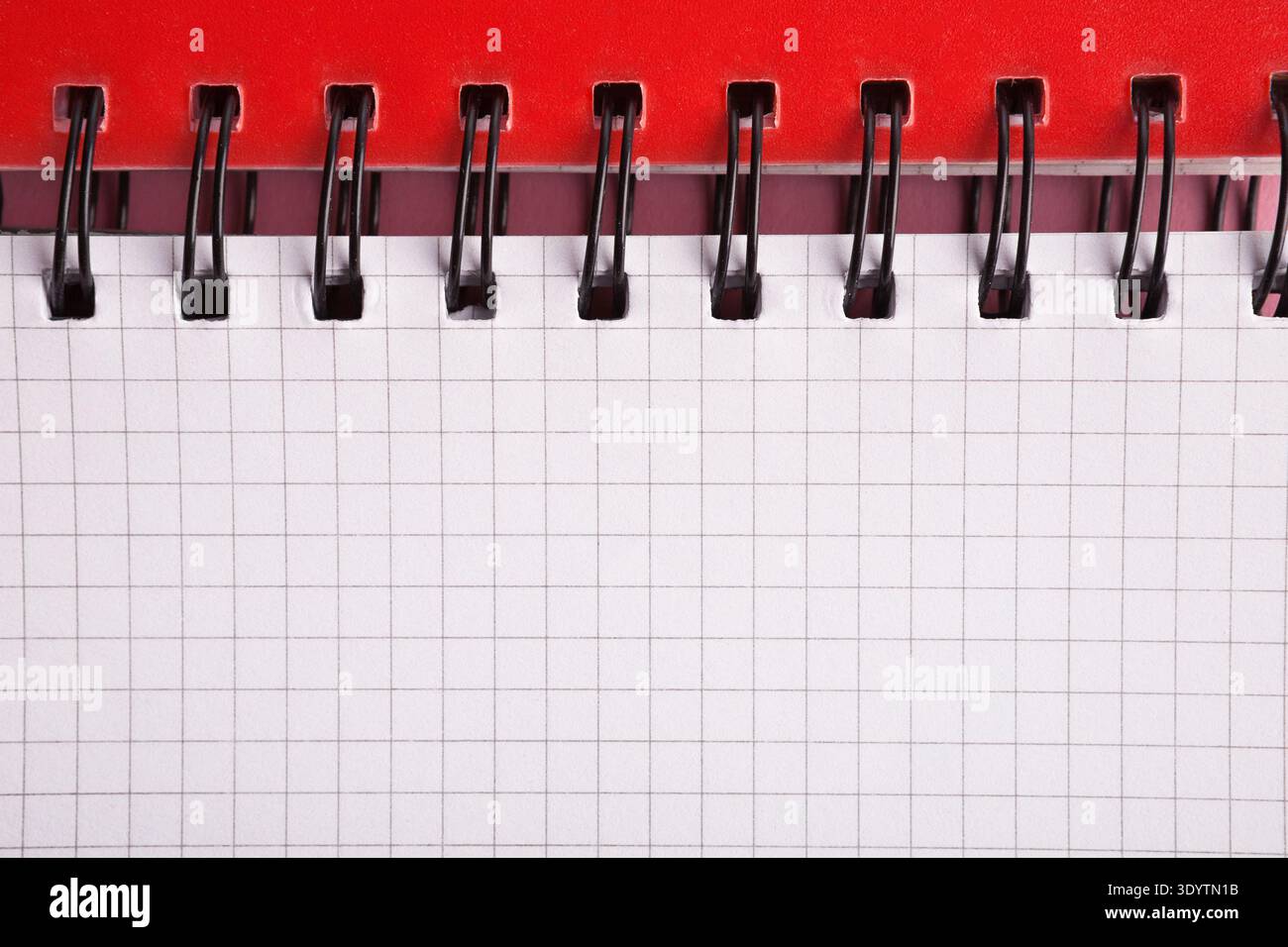 Closeup of notepad springs and paper, copy space for text Stock Photo
