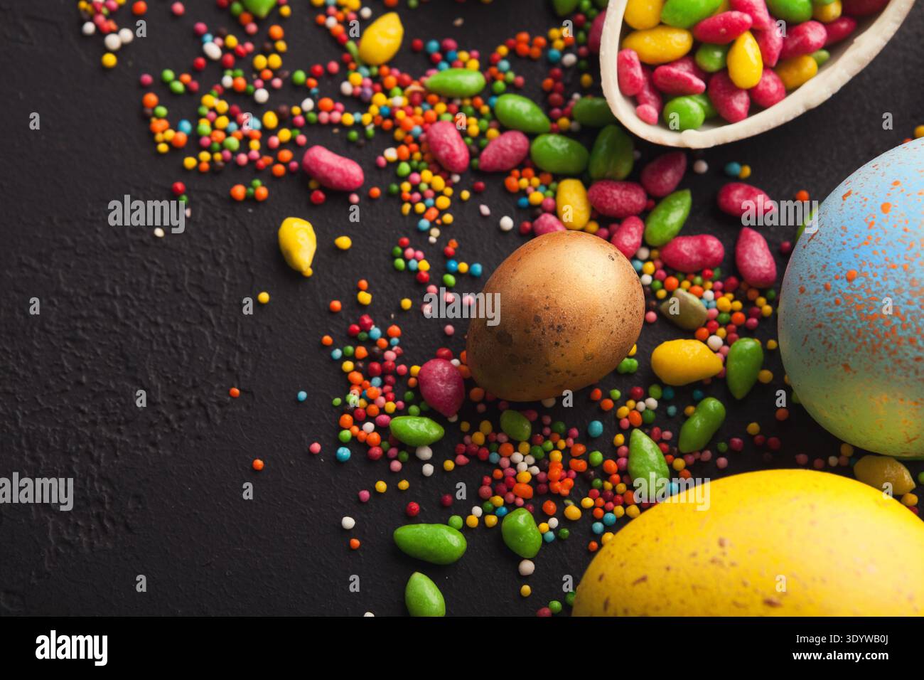 Colored easter eggs on dark background Stock Photo