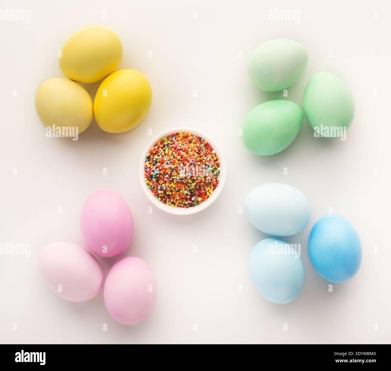 Easter background. Colored eggs on white, isolated Stock Photo