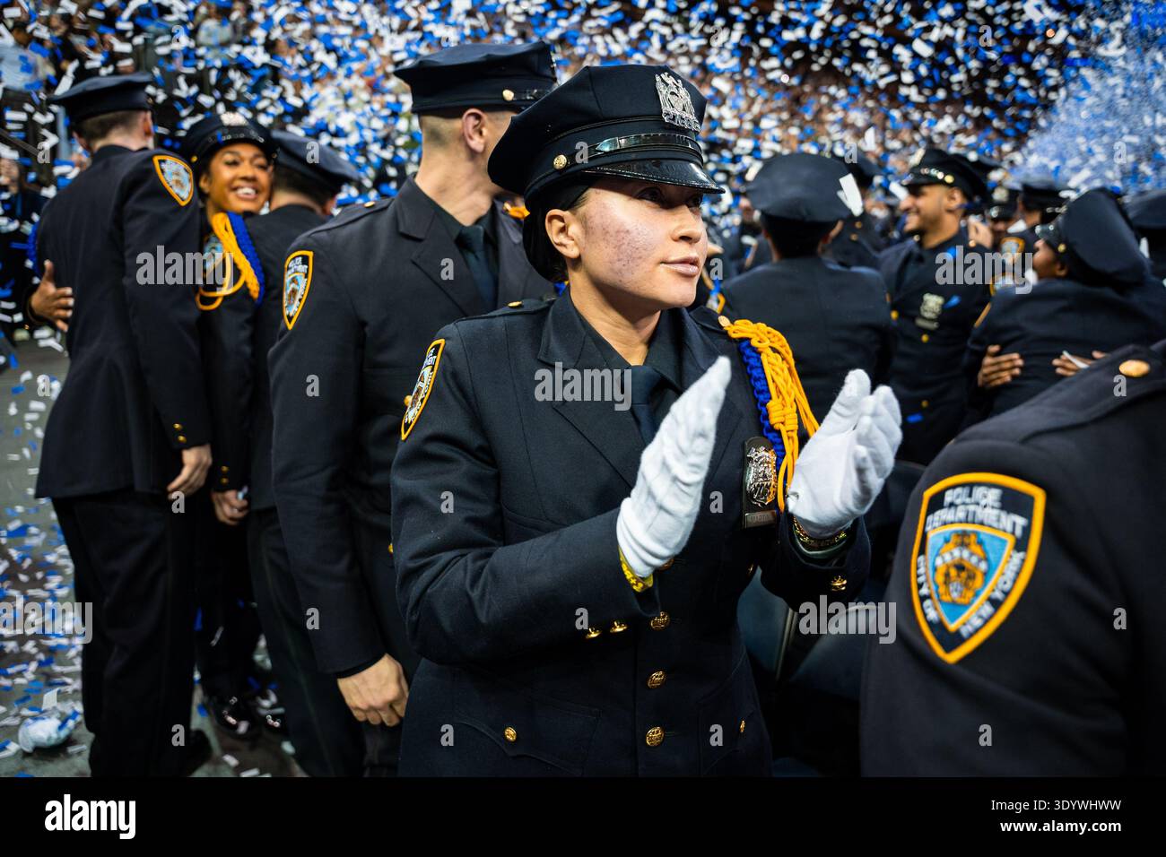 Newly-sworn in New York City Police Officers celebrate graduating from ...