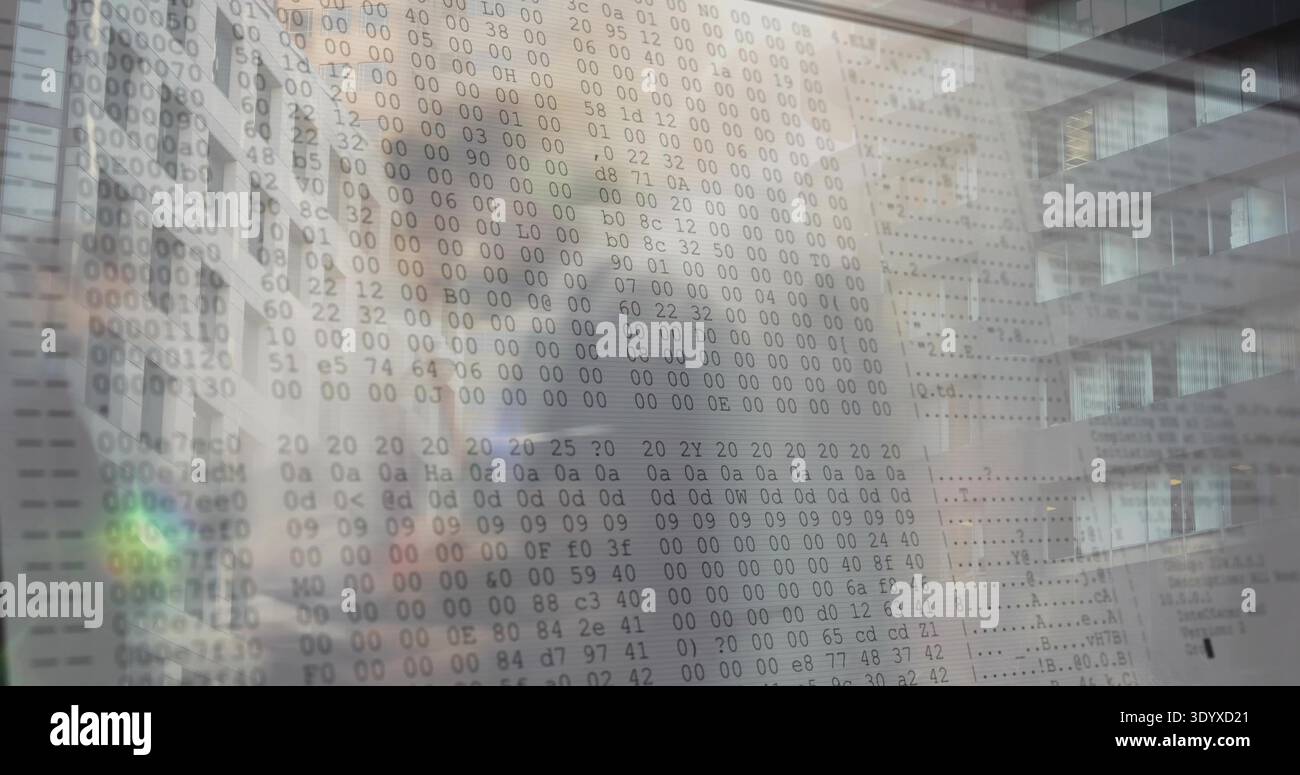 Displaying translucent display showing hexadecimal dump in office atrium with reflected facade Stock Photo