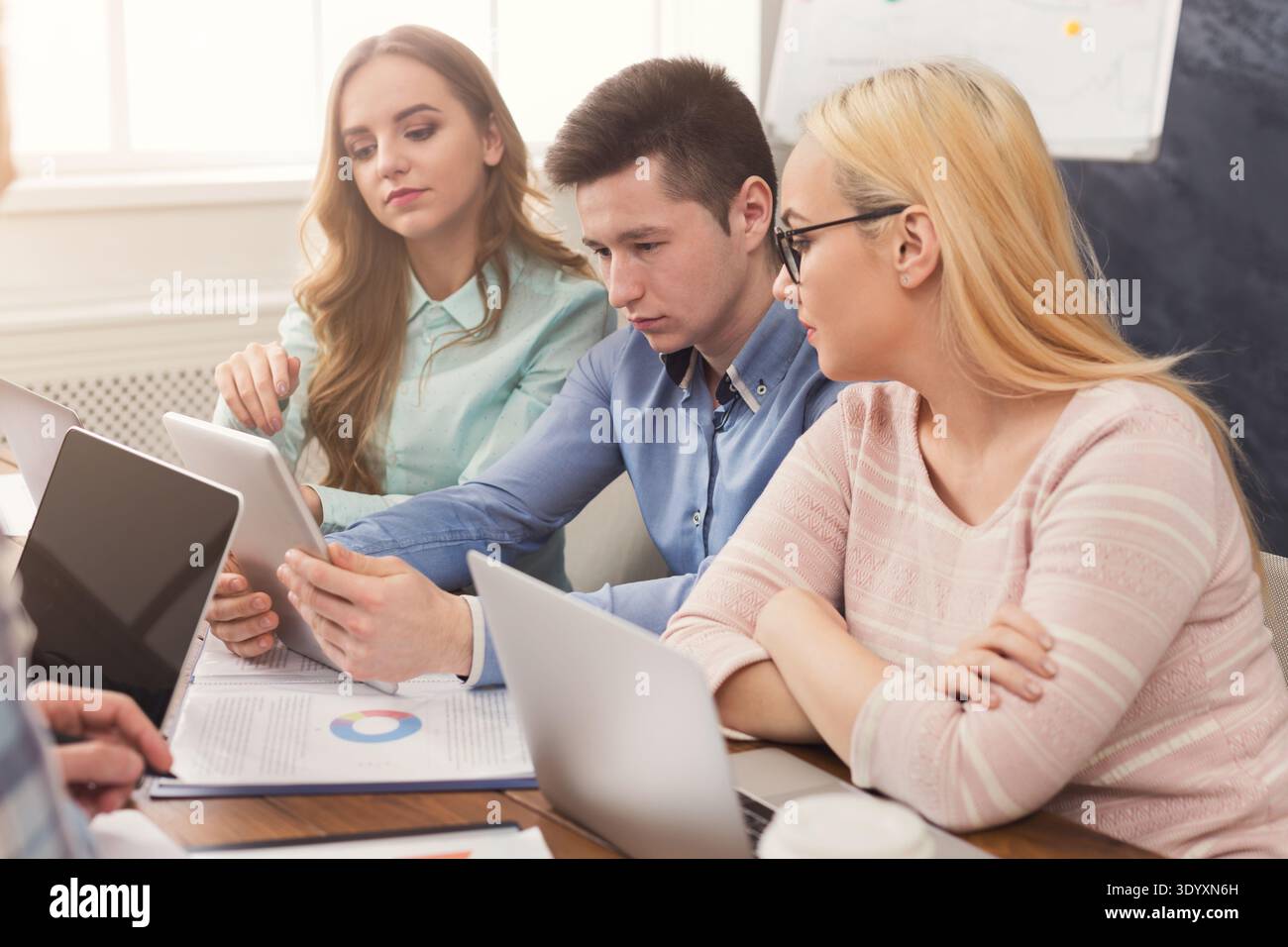 Programmers working in software developing company Stock Photo