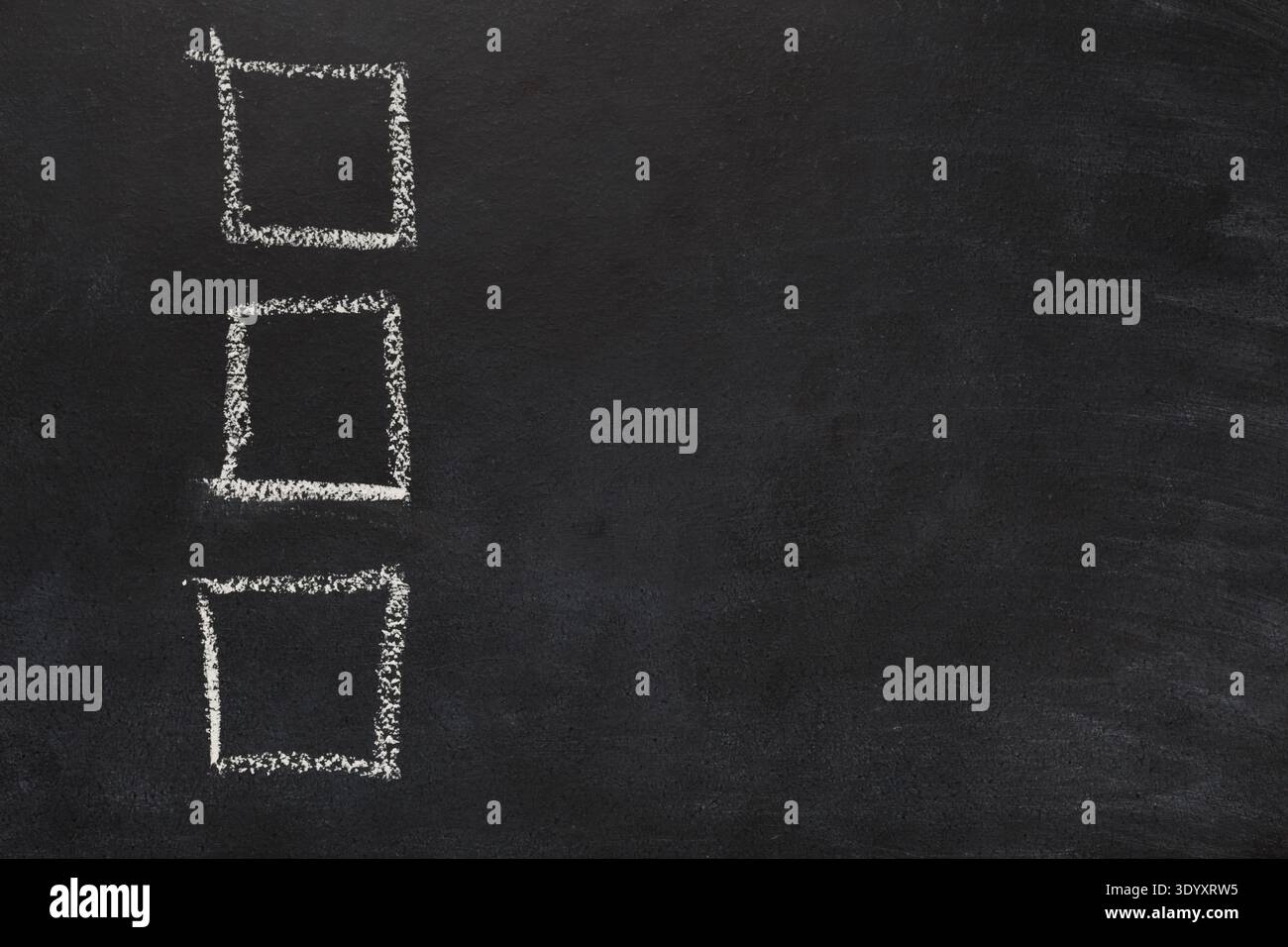 Empty checkboxses drawn with chalk on black background Stock Photo