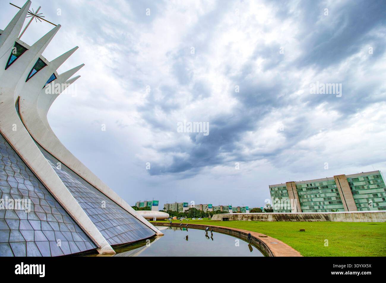 Brasília Cathedral with beautiful morning clouds; the cathedral's dome ...
