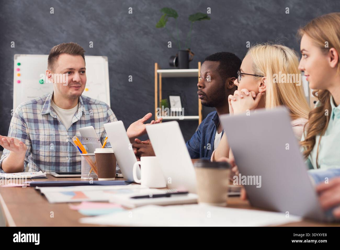 Programmers working in software developing company Stock Photo