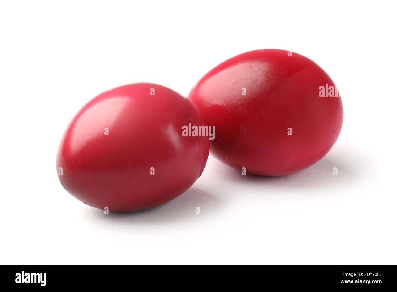 Two pickled quail eggs isolated on white Stock Photo