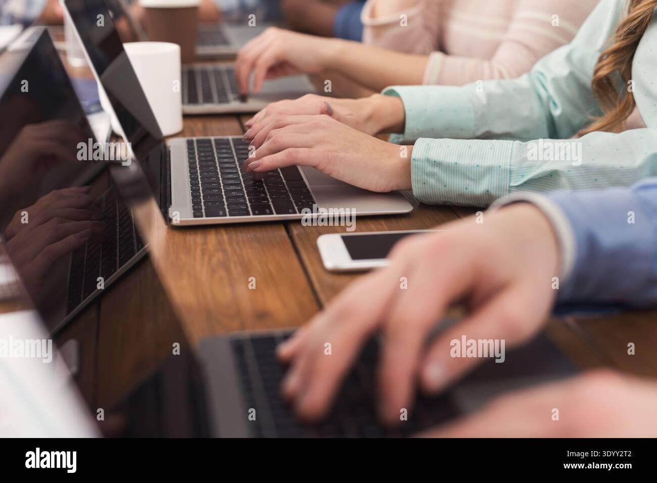 Programmers working in software developing company Stock Photo