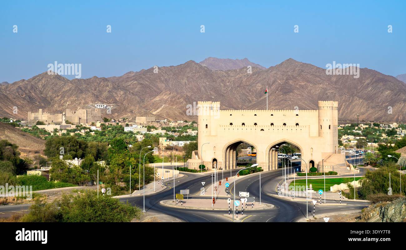 The monumental Bahla Gate serves as an entry to the ancient town, set ...
