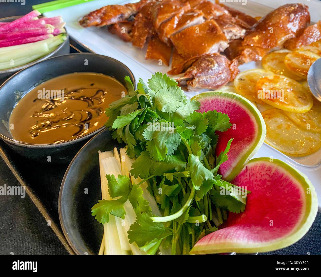 Peking duck with accompanying fixings Stock Photo