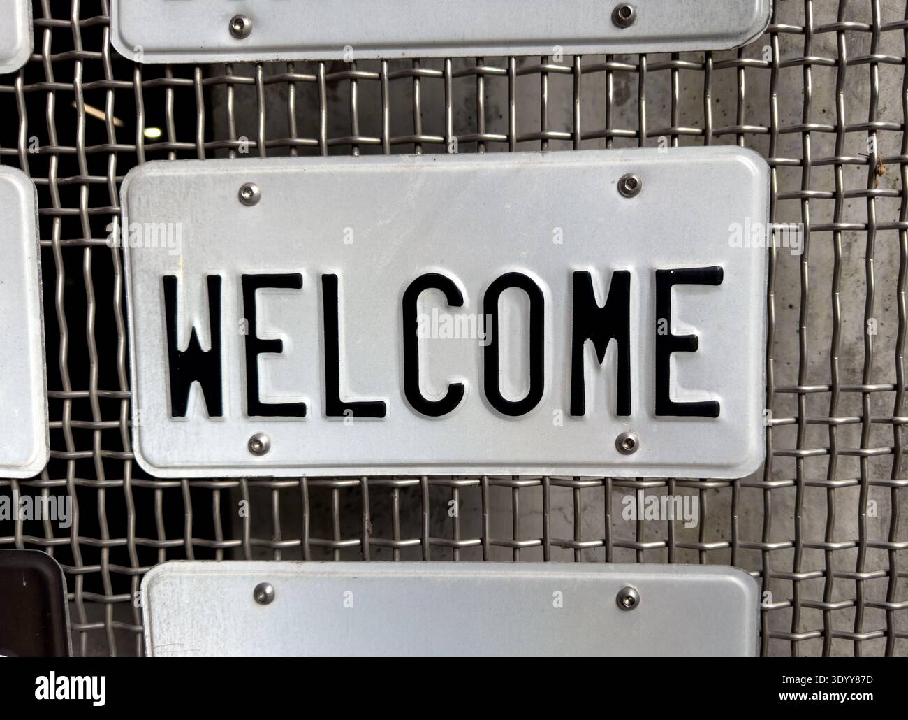 Welcome Sign Local Welcome sign in the form of vanity license plate in art installation ...