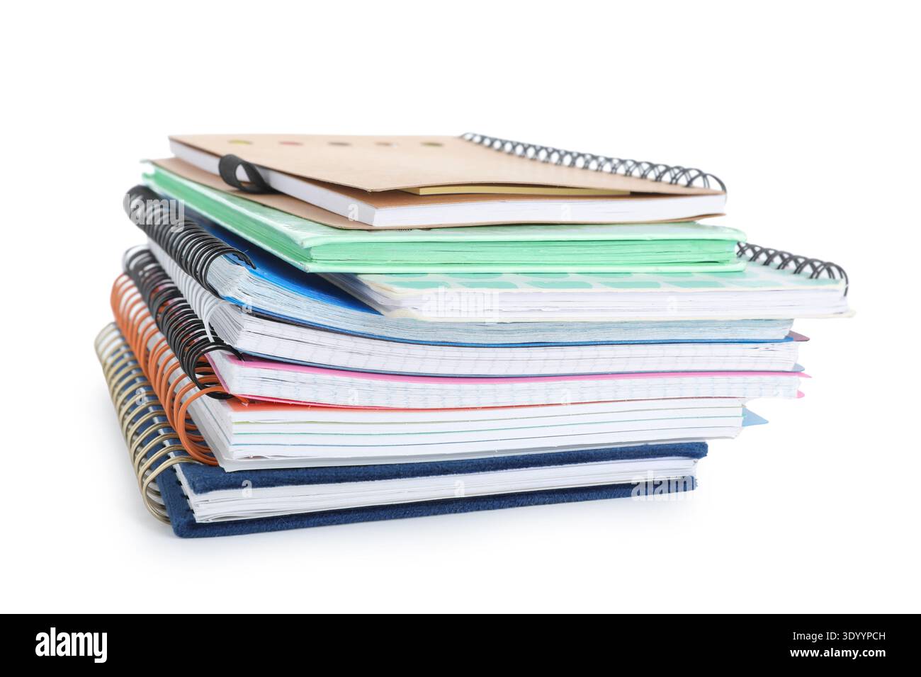 Stack of many different notebooks isolated on white background Stock Photo