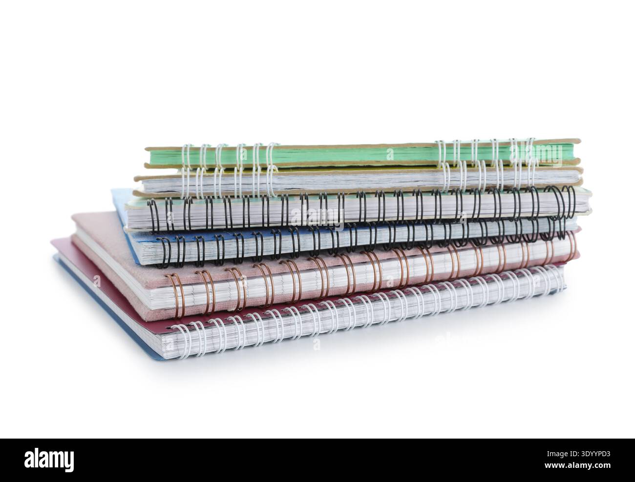 Stack of many different notebooks isolated on white background Stock Photo