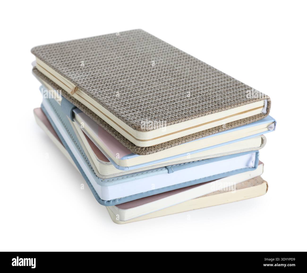 Stack of many different notebooks isolated on white background Stock Photo