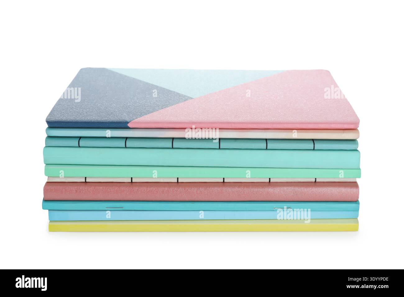 Stack of many different notebooks isolated on white background Stock Photo