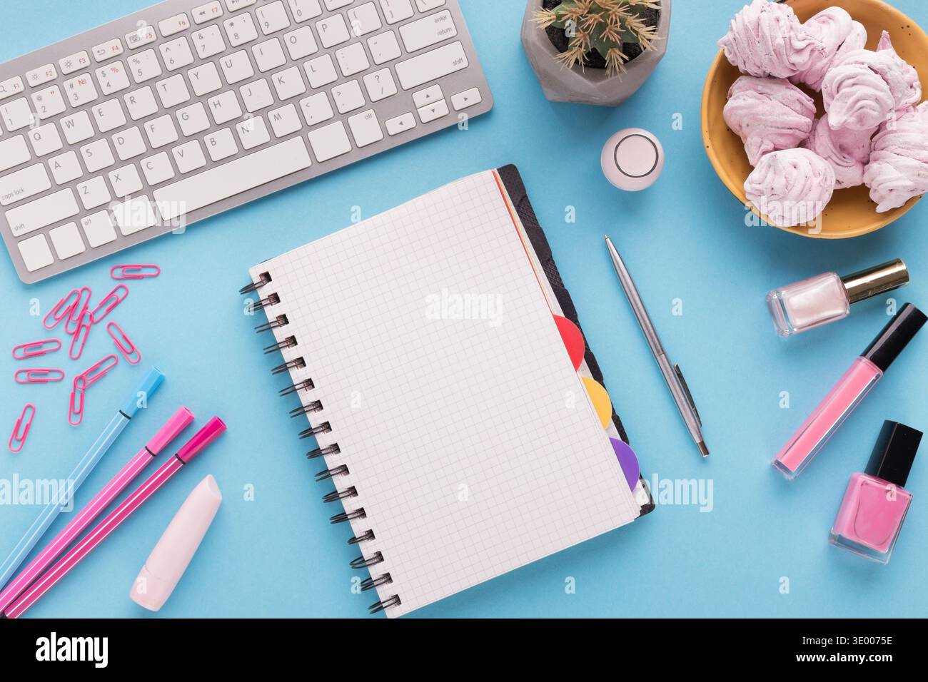 Spiral notepad on blue background, top view Stock Photo