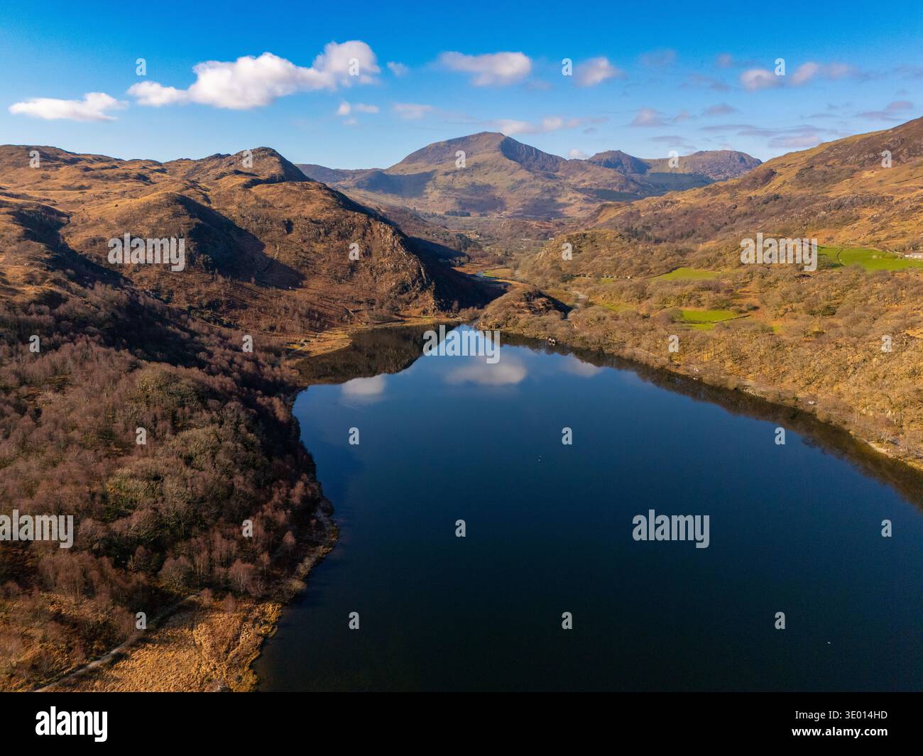 Llyn Dina or Dinas Lake on a beutifuly March morning with clear blue sky and calm water, Snowdonia, North Wales Stock Photo