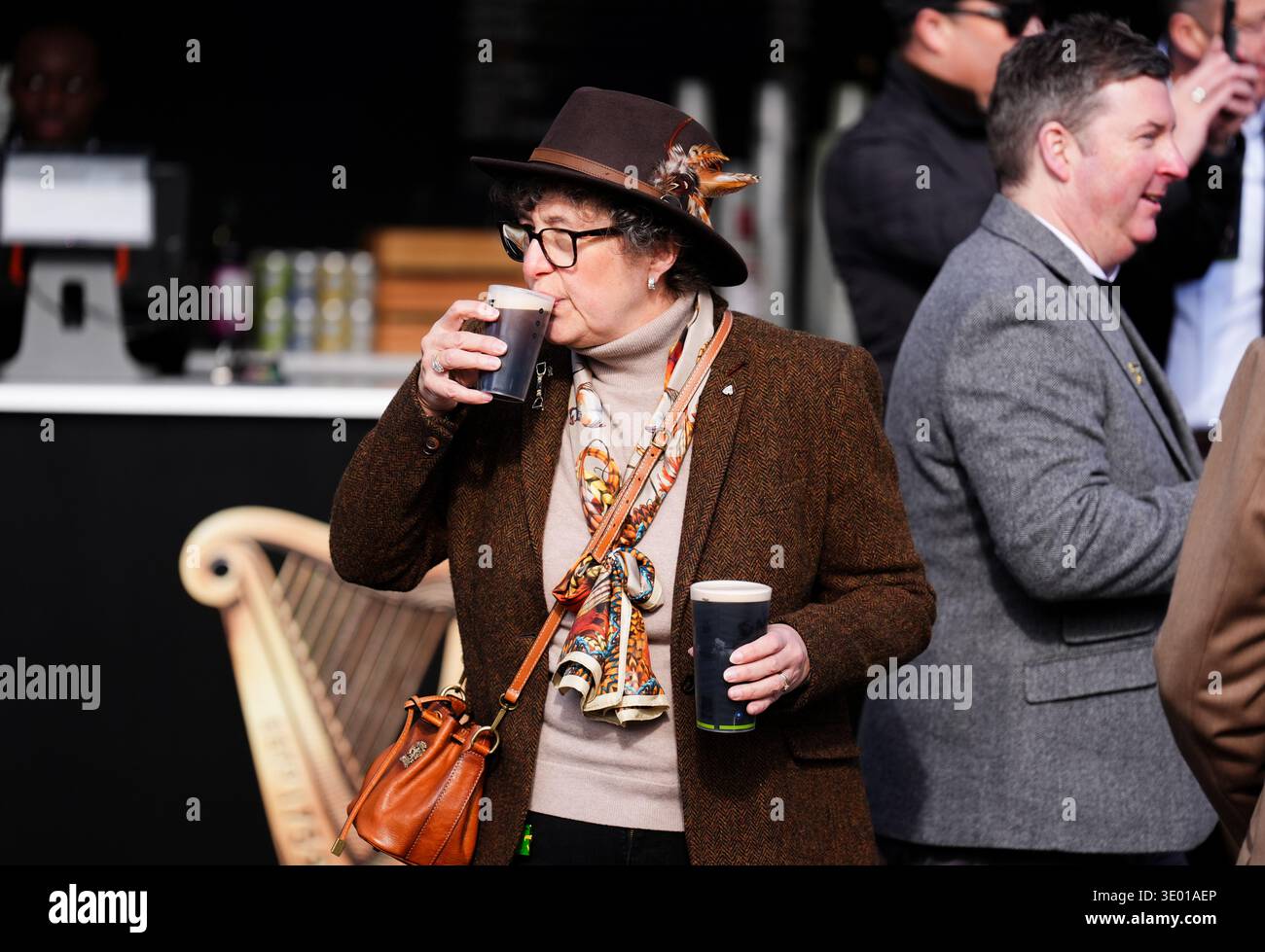 A racegoer with a Guinness on day one of the 2026 Cheltenham Festival ...