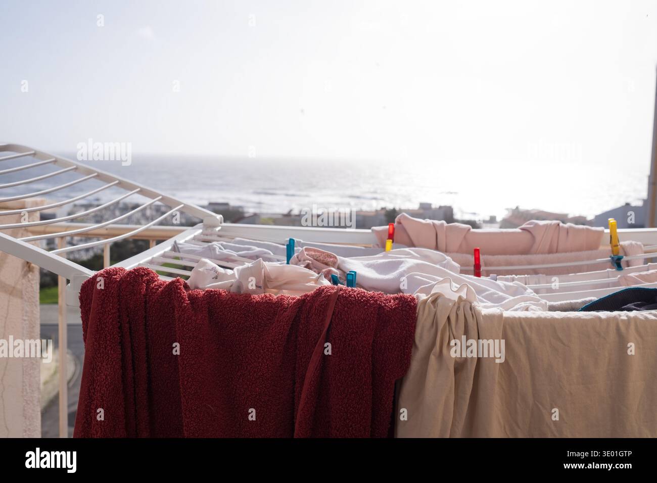 Laundry Drying on Balcony with Ocean View Stock Photo