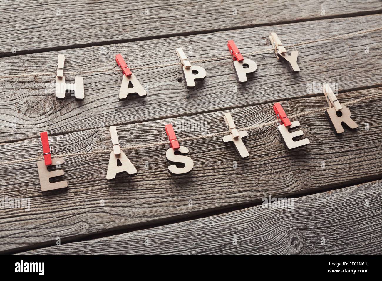 Easter greetings hanging on the rope Stock Photo