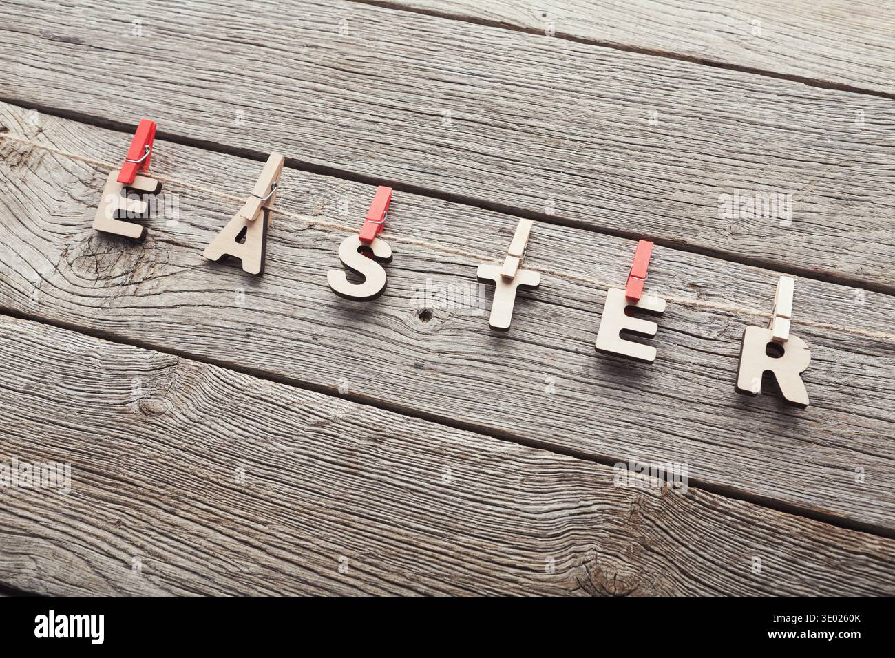 Easter greetings hanging on the rope Stock Photo