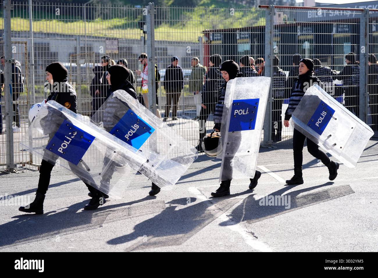 Police officers in riot gear ahead of the UEFA Champions League round ...
