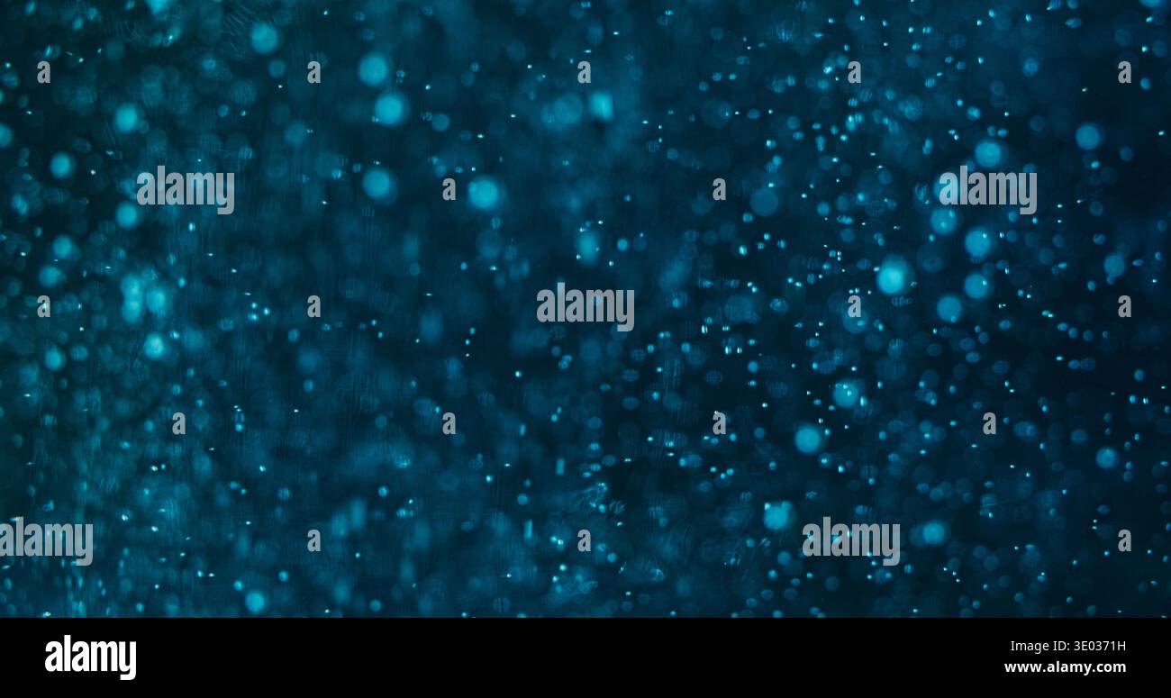 Bokeh circles luminosity particles fly blue glow Stock Photo