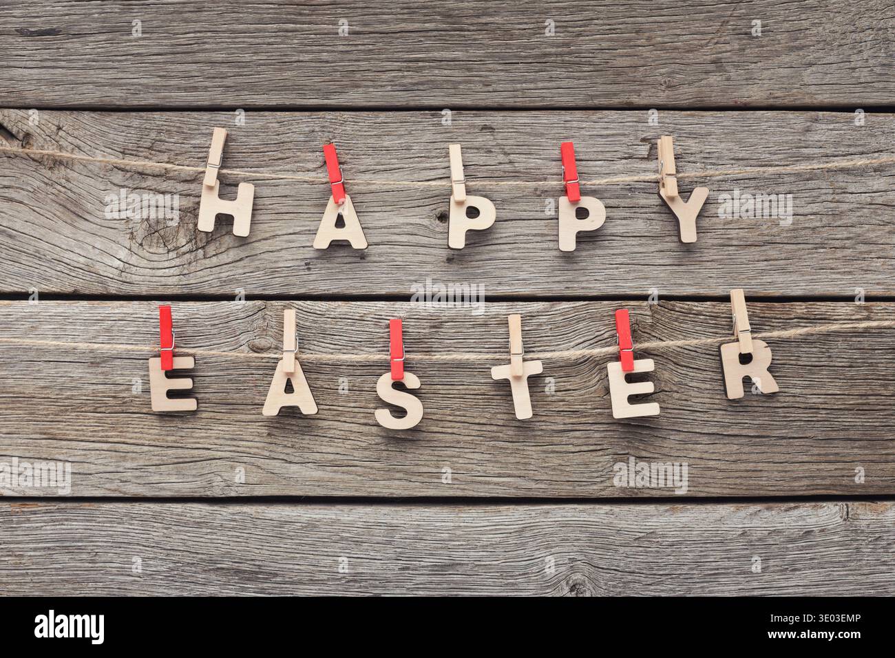 Easter greetings hanging on the rope Stock Photo