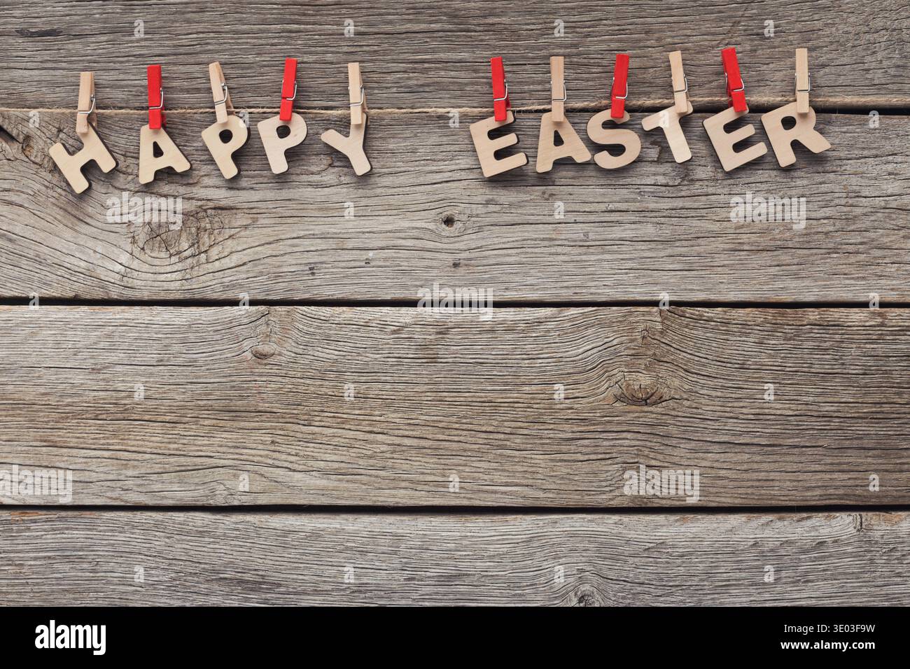 Easter greetings hanging on the rope Stock Photo