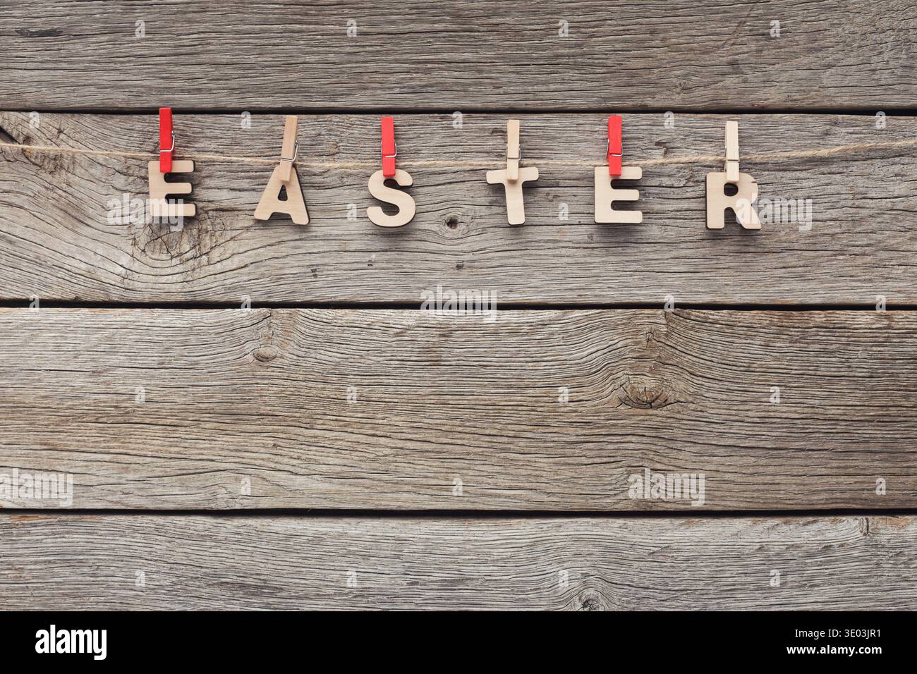 Easter greetings hanging on the rope Stock Photo