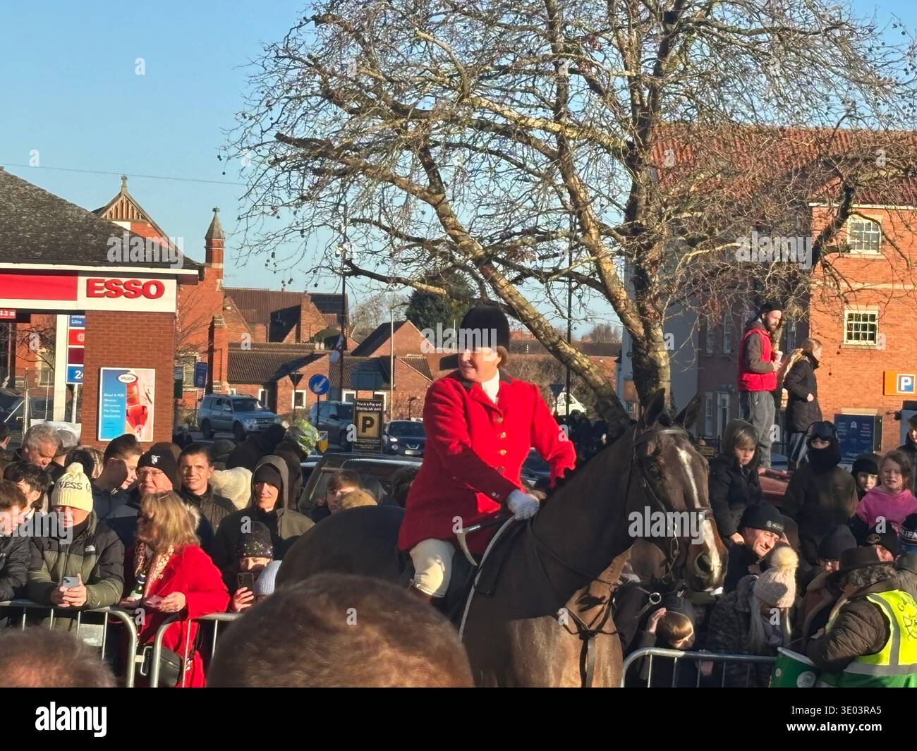 Joint Masters Of The Hunt wit female and male riders dressed in tradtional red hunting jackets and white breeches gather on horse back in front. DN10 - Smartphone Captured Stock Image