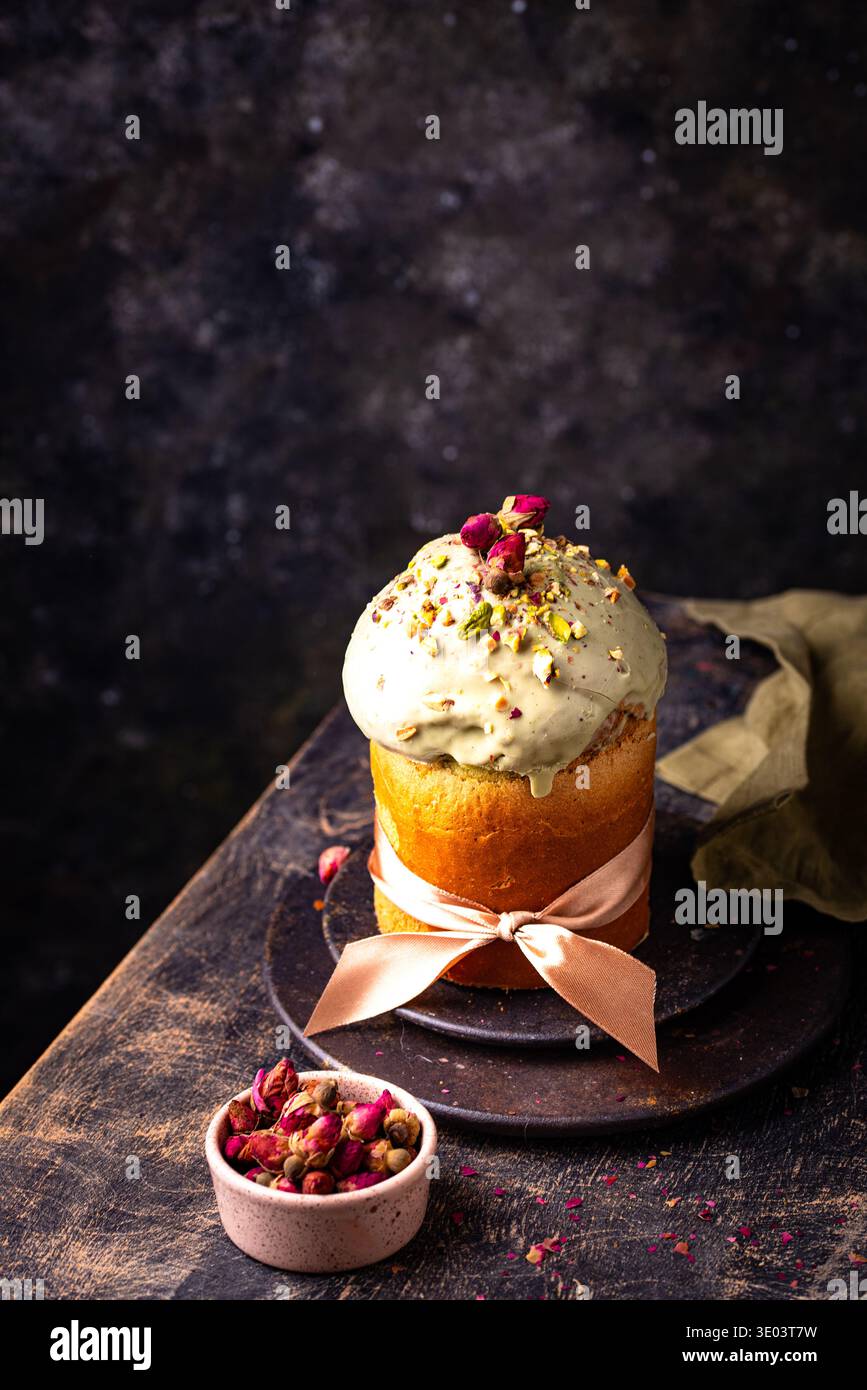 Traditional Easter cake kulich with pistachio Stock Photo