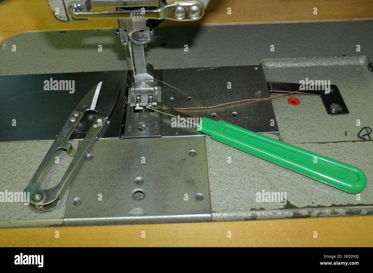 Sewing Machine Feed Mechanism Being Repaired With Tools And Removed ...