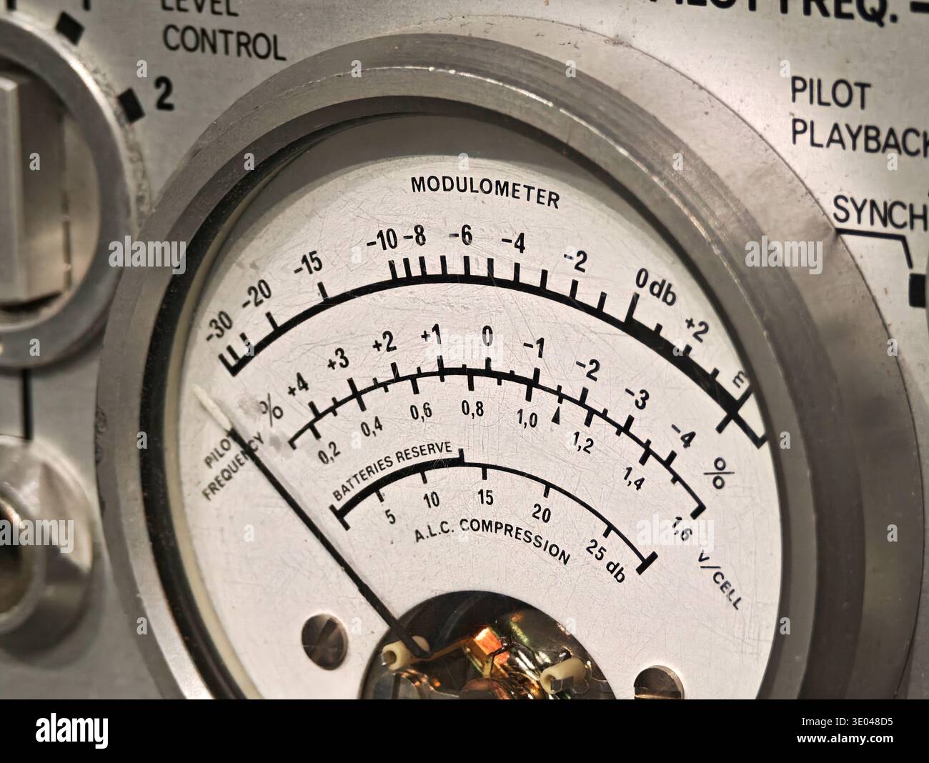 Modulator Meter Vintage modulometer analog audio meter and metal control panel closeup ...