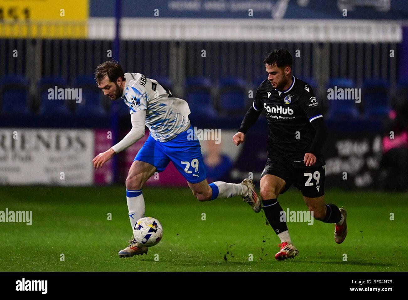 Furness Rovers Barrow's Tom Barkhuizen in action with Bristol Rovers' Fabrizio Cavegn ...