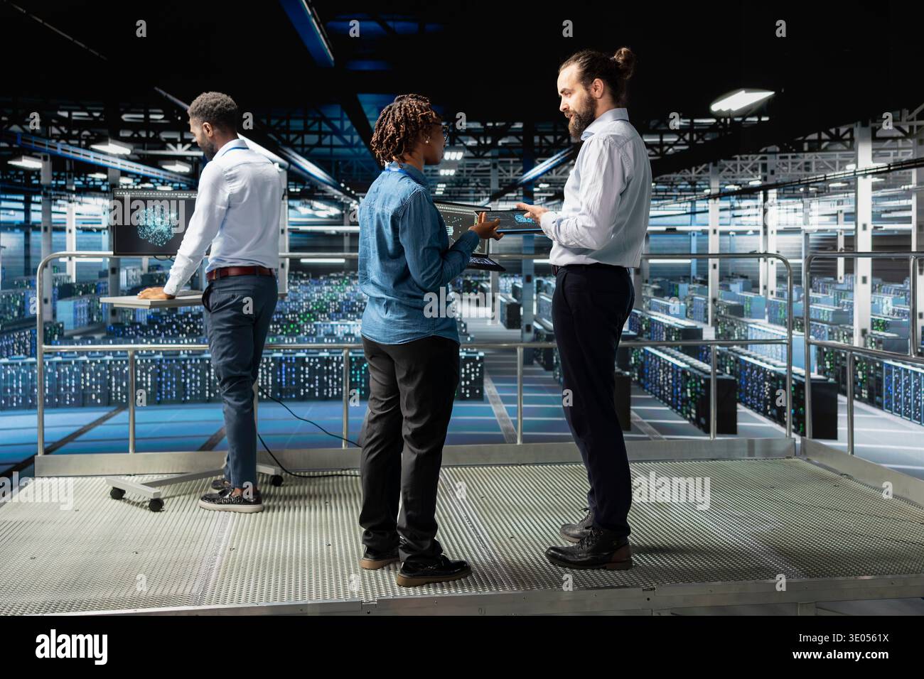 Data center engineers team performing maintenance on supercomputers with artificial intelligence. Server room staff members upgrading rigs used for machine learning, software engineering. Stock Photo