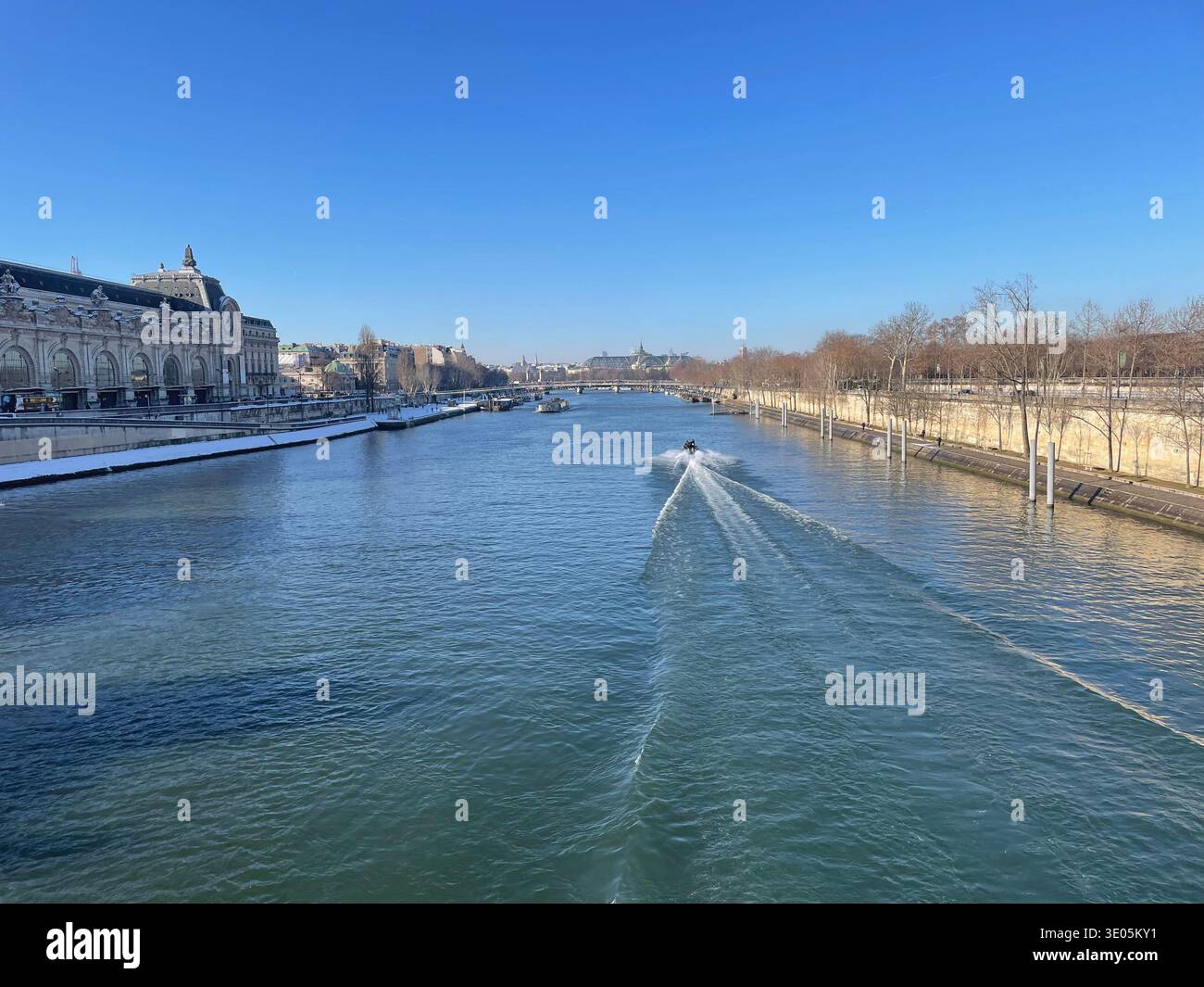 Paris, France. View of the Seine River in a sunny winter day, with Musée d'Orsay seen on the left. - Smartphone Captured Stock Image
