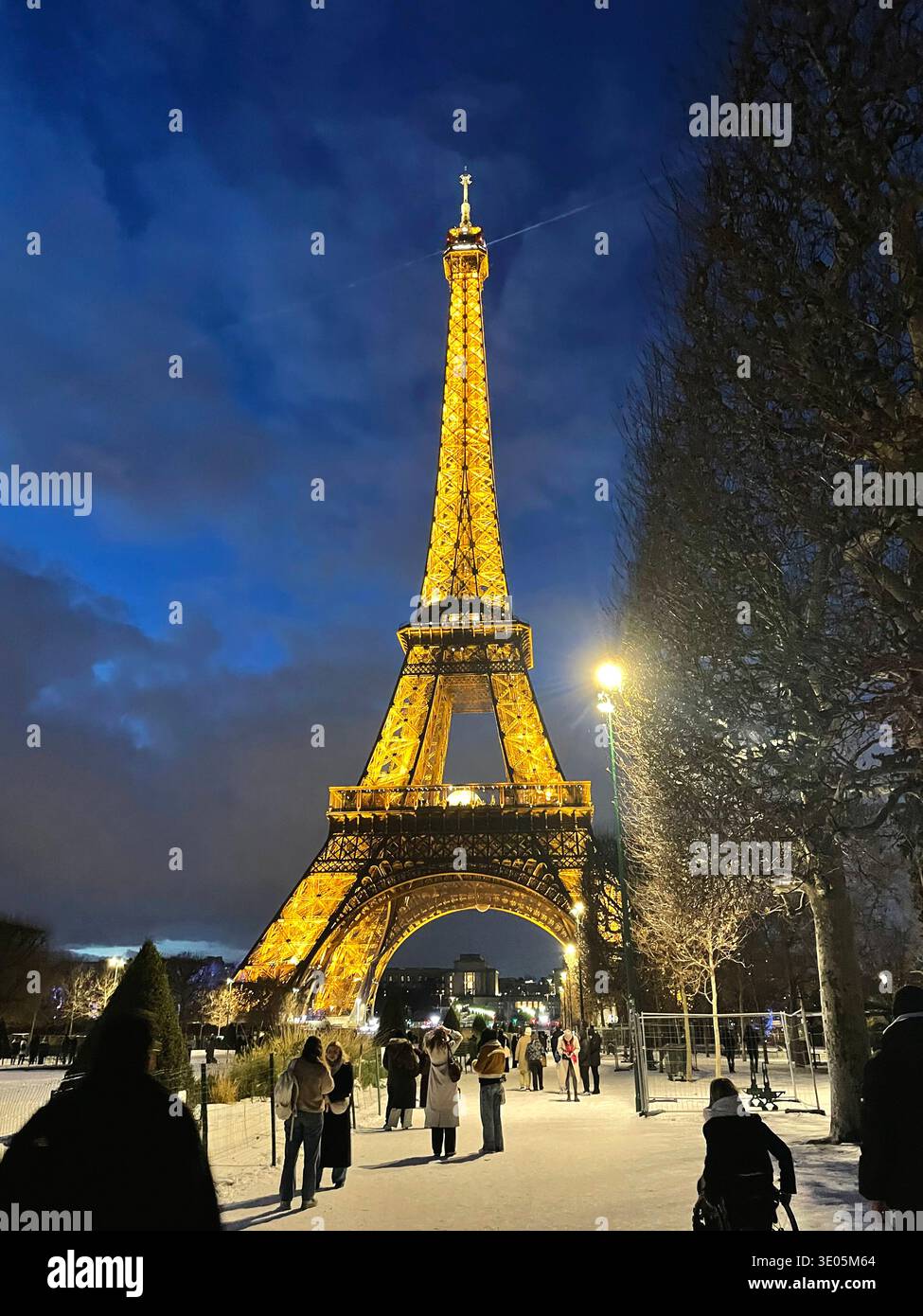 Paris, France. View of the Eiffel Tower illuminated at night. - Smartphone Captured Stock Image