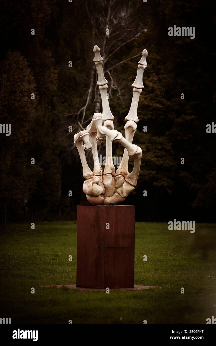 Oversized hand skeleton as stylish symbol of human mortality Stock Photo