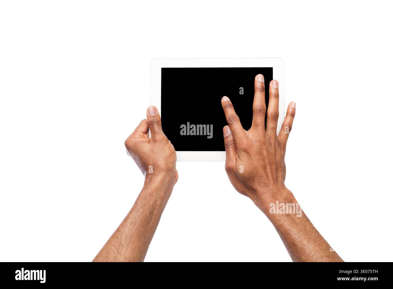 Holding and pointing on blank screen on tablet Stock Photo