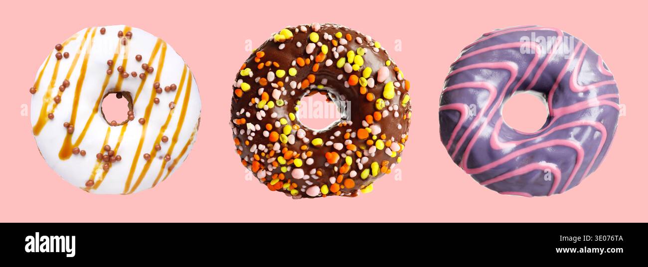 Different tasty donuts on pink background, set Stock Photo