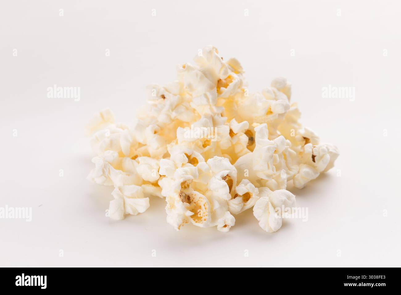 Popcorn pile isolated on white background Stock Photo