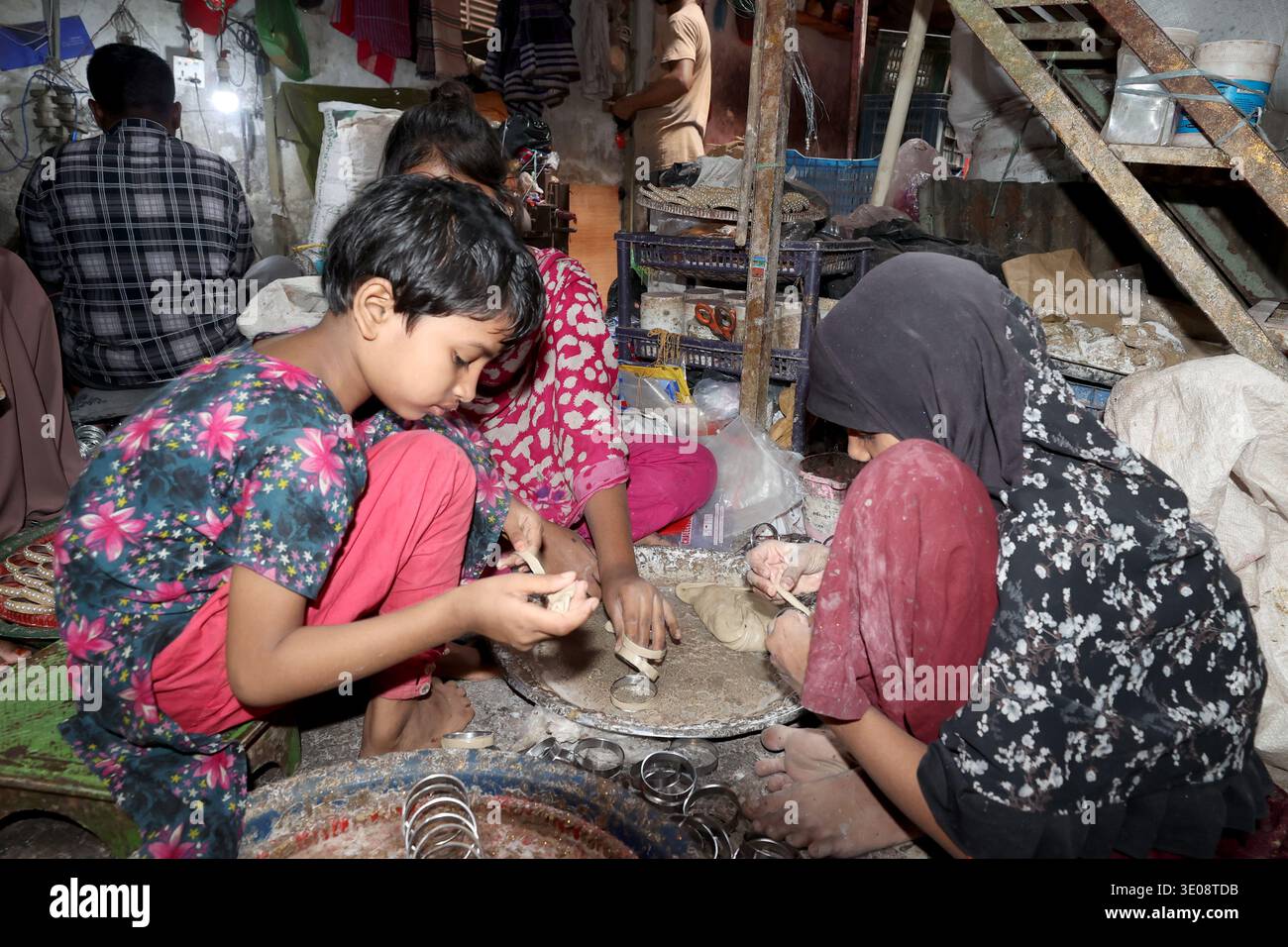 Dhaka, Bangladesh - March 07, 2026: Child workers are making colorful ...