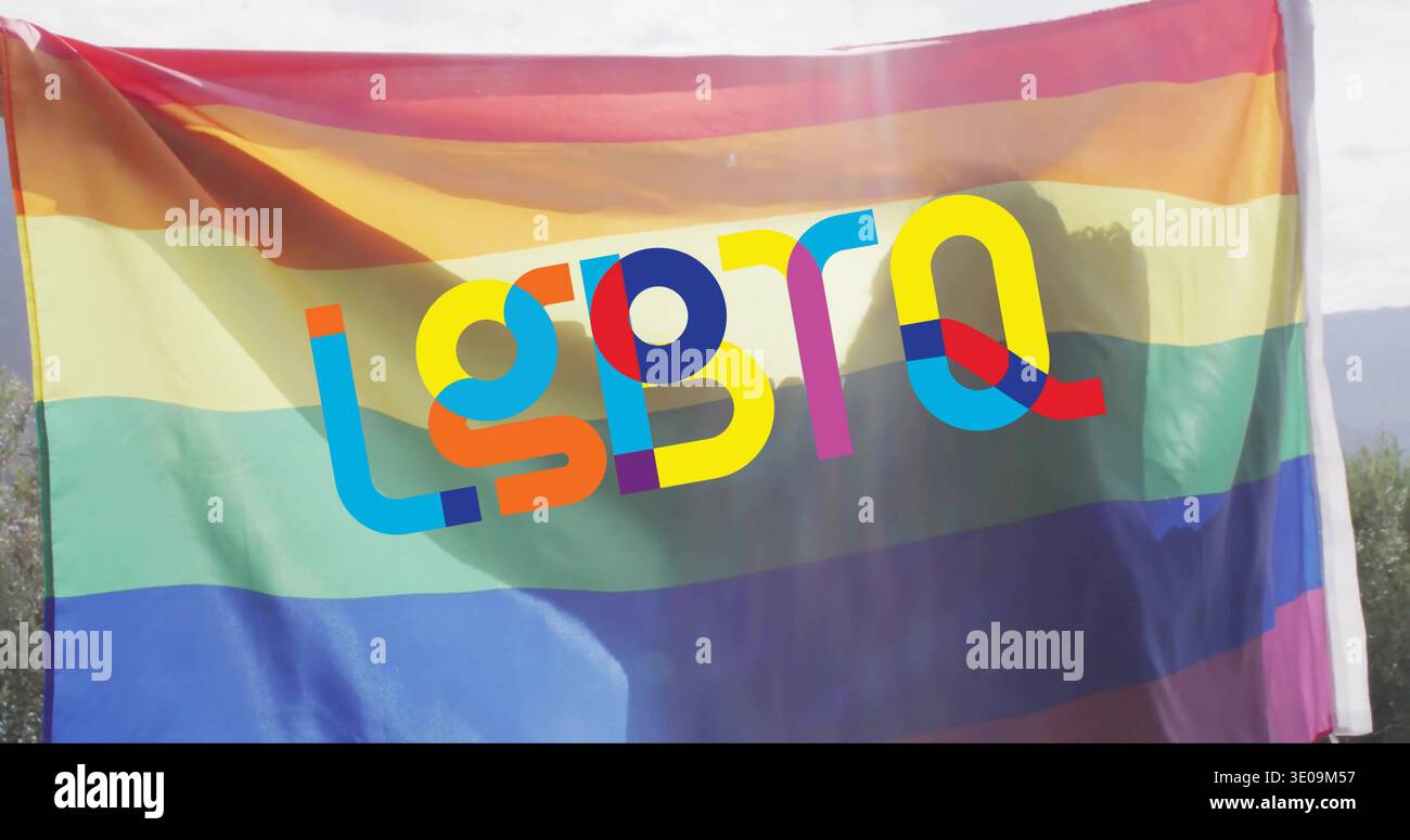 Waving wide rainbow pride hi-res stock photography and images - Alamy