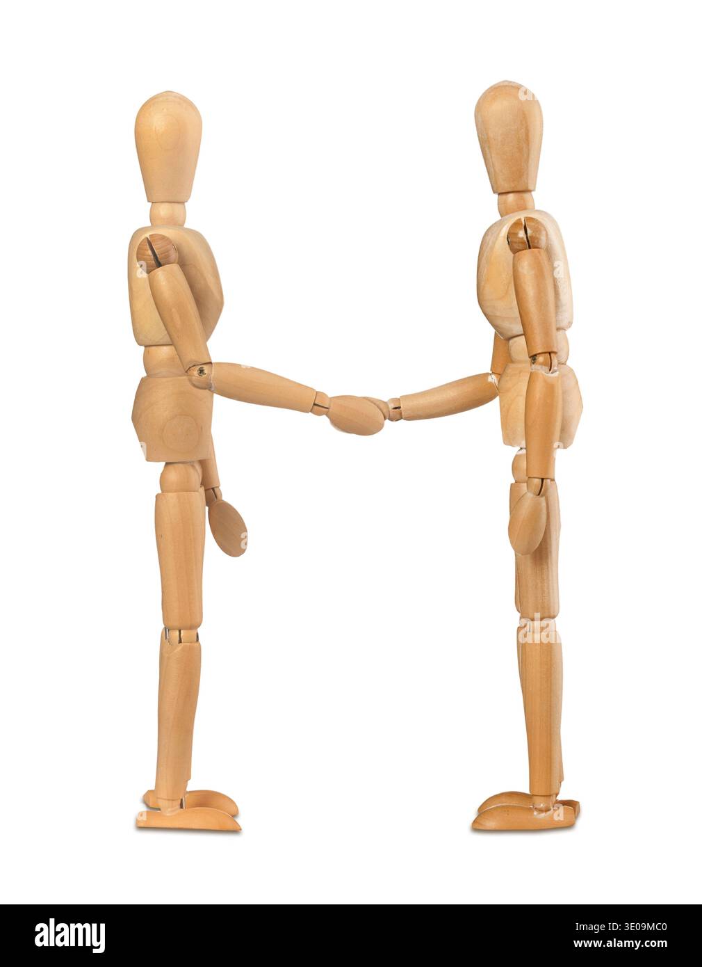 Two wooden dummies shake hands on white background Stock Photo