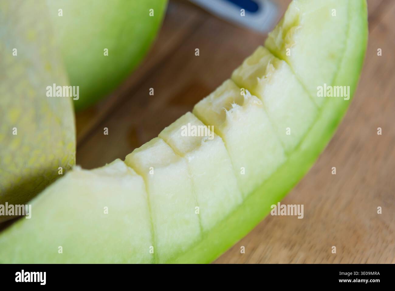 Fresh green melon on wood plate Stock Photo