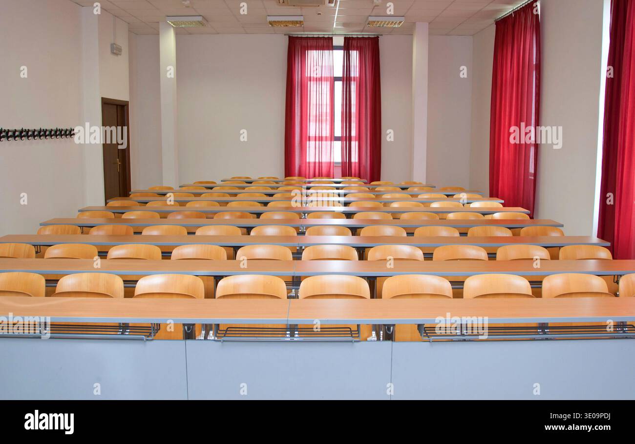 Empty classroom with wood chairs Stock Photo